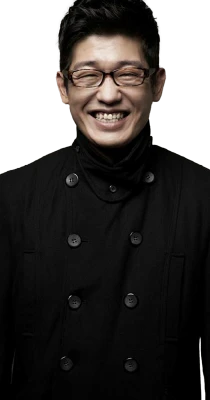 Smiling Asian Man In Black Coat Clipart